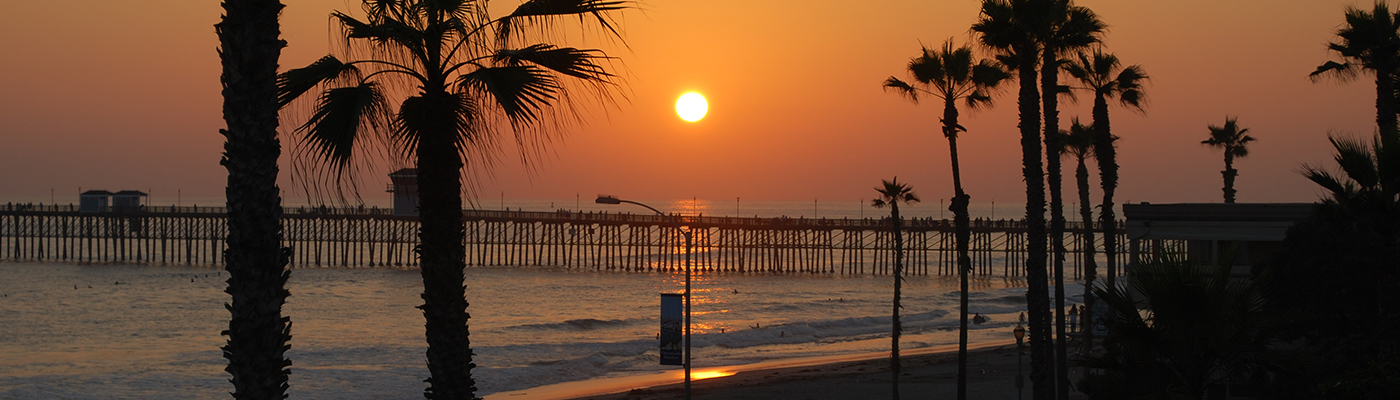 Sunset over beach pier